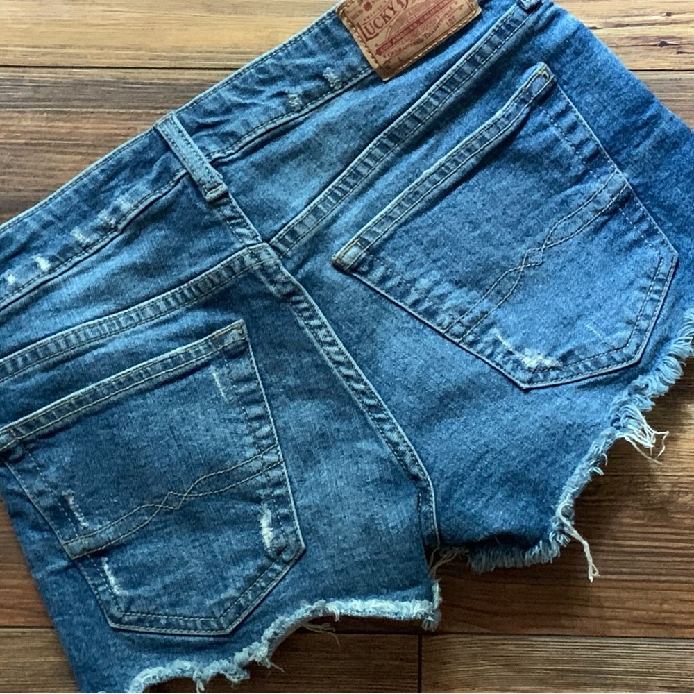 Lucky Brand The Cut Off Raw Hem Jean Shorts Sz O/25 Denim Distressed - Picture 9 of 10